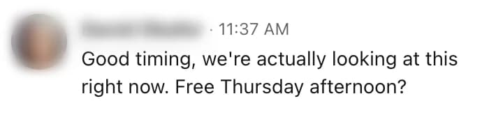 A prospect's reply on LinkedIn agreeing to talk, name blurred.